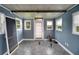 Versatile bonus room with tiled floors and natural light at 11635 Se Highway 42, Weirsdale, FL 32195