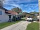 Carport with a white truck parked underneath at 11635 Se Highway 42, Weirsdale, FL 32195