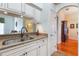 Well-appointed kitchen featuring granite countertops and custom cabinets at 3506 Mulberry Grove Loop, Leesburg, FL 34748