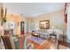 Inviting living room featuring hardwood floors and comfortable seating at 3506 Mulberry Grove Loop, Leesburg, FL 34748
