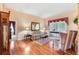 Cozy living room with classic decor and a warm, inviting ambiance at 3506 Mulberry Grove Loop, Leesburg, FL 34748