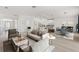 Bright and open living area with hardwood floors and modern decor throughout at 27227 Roanoke Dr, Leesburg, FL 34748
