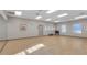An expansive, bright exercise studio with mirrored wall and ample space for various activities at 27227 Roanoke Dr, Leesburg, FL 34748