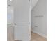 Bright hallway with an open door to bathroom showing the toilet at 3106 Voyager Ave, St Cloud, FL 34771