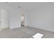 Bright bedroom with neutral carpet and access to an ensuite bathroom at 6521 Daypack Ln, St Cloud, FL 34771