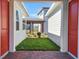 Charming courtyard view with neighboring houses at 6521 Daypack Ln, St Cloud, FL 34771