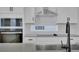 Modern kitchen with stainless steel appliances and subway tile backsplash at 6521 Daypack Ln, St Cloud, FL 34771
