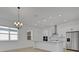Kitchen with stainless steel appliances, white cabinets, and recessed lighting at 6521 Daypack Ln, St Cloud, FL 34771