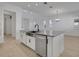 Modern kitchen island with stainless steel appliances at 6521 Daypack Ln, St Cloud, FL 34771