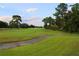 Landscaped golf course with walking path at 2360 Park Forest Blvd, Mount Dora, FL 32757