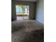 Carpeted bedroom with sliding glass doors leading to a patio at 849 Millrace Pt, Longwood, FL 32750