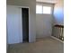 Bedroom with carpet, a closet with sliding doors, and a window at 849 Millrace Pt, Longwood, FL 32750