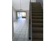 Stairs leading to upper level with view of living area at 849 Millrace Pt, Longwood, FL 32750