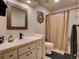 Clean bathroom with a single vanity and shower/tub combo at 21945 King Henry Ave, Leesburg, FL 34748