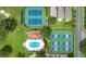 Community pool and tennis courts from above at 5008 Greenbriar Trl, Mount Dora, FL 32757