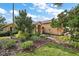 Landscaped front yard with stone pathway at 5008 Greenbriar Trl, Mount Dora, FL 32757