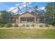 Enclosed pool and patio area with screened enclosure, providing ample outdoor space at 5008 Greenbriar Trl, Mount Dora, FL 32757