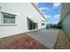 Backyard patio with brick walkway and gravel at 9215 Sw 90Th St, Ocala, FL 34481