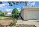 Front view of house with landscaping and garage at 9215 Sw 90Th St, Ocala, FL 34481