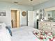 Tranquil bedroom featuring soft colors, natural light, and ample closet space, creating a serene retreat for relaxation and rest at 1771 Henin Cir, Tavares, FL 32778
