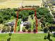 Aerial view of a property, surrounded by lush greenery and clearly marked boundaries at 26012 Splendid Meadow Ct, Astatula, FL 34705