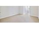 Bedroom featuring carpet floors, base molding, a window and lots of natural light at 26012 Splendid Meadow Ct, Astatula, FL 34705