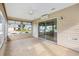 Bright sunroom with tile flooring and sliding glass doors at 9400 Se 176Th Saffold St, The Villages, FL 32162