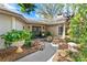 Inviting front entrance with double doors, porch, and landscaping at 1785 Maine Ct, Tavares, FL 32778