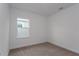 Simple bedroom with window and carpeted floor at 17036 Clear Mind Aly, Winter Garden, FL 34787