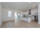 Modern kitchen with white cabinets, stainless steel appliances, and island at 17036 Clear Mind Aly, Winter Garden, FL 34787