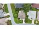 Aerial view of home showcasing mature landscaping, and a well-maintained yard in a quiet neighborhood at 1902 Rosario Rd, Lady Lake, FL 32159