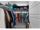 Large walk-in closet with plenty of hanging and shelving space for clothes at 6867 Mickylee Run, The Villages, FL 34762