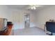 Bedroom view showcasing neutral carpet, two closets, and access to the hallway at 115 Lake Emma Cove Dr # 1, Lake Mary, FL 32746