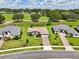 Aerial view of homes and community at 38905 Harborwoods Pl, Lady Lake, FL 32159