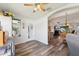 Bright dining area with view into the living room at 1101 Blythe Way, The Villages, FL 32162