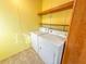 Laundry room with washer and dryer hookups at 1660 Elkhart Cir, Tavares, FL 32778