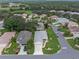 Aerial view of a house in a residential neighborhood at 21835 King Henry Ave, Leesburg, FL 34748