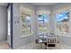 Charming kitchen nook with a table and window seating at 21835 King Henry Ave, Leesburg, FL 34748