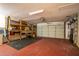 Two-car garage with built-in shelving and storage at 28432 Tammi Dr, Tavares, FL 32778