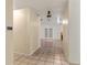 Bright hallway with tile floors leading to living room at 28432 Tammi Dr, Tavares, FL 32778