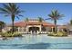 Resort-style community pool with inviting lounge chairs and beautifully landscaped surroundings at 436 Orange Cosmos Blvd, Davenport, FL 33837