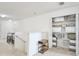 Bright upstairs hallway featuring closet with ample storage, carpeting and access to other rooms at 436 Orange Cosmos Blvd, Davenport, FL 33837