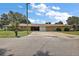 Ranch style home with attached garage and a large yard at 8 Se Ocale Way, Summerfield, FL 34491