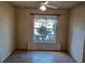 Modest bedroom featuring natural lighting and simple decor at 8590 Se 157Th Pl, Summerfield, FL 34491