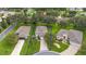 Aerial view of the property, highlighting its landscaping and location within the community at 5206 Fantasy Way, Leesburg, FL 34748