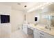 Bright Primary bath with dual sinks, soaking tub, and ample counter space at 5206 Fantasy Way, Leesburg, FL 34748