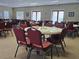 Community meeting room with tables set for a luncheon or meeting at 5206 Fantasy Way, Leesburg, FL 34748