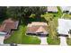 Aerial view of single-story home with driveway at 6410 Tildon Ct, Leesburg, FL 34748