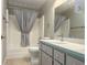 Bathroom with shower/tub combo and updated vanity at 6410 Tildon Ct, Leesburg, FL 34748