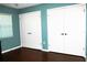 Bright bedroom with double closets and wood flooring at 6410 Tildon Ct, Leesburg, FL 34748